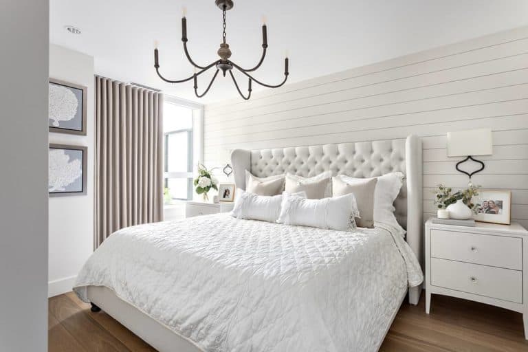 After: A bright and airy bedroom is accented by farmhouse style details.