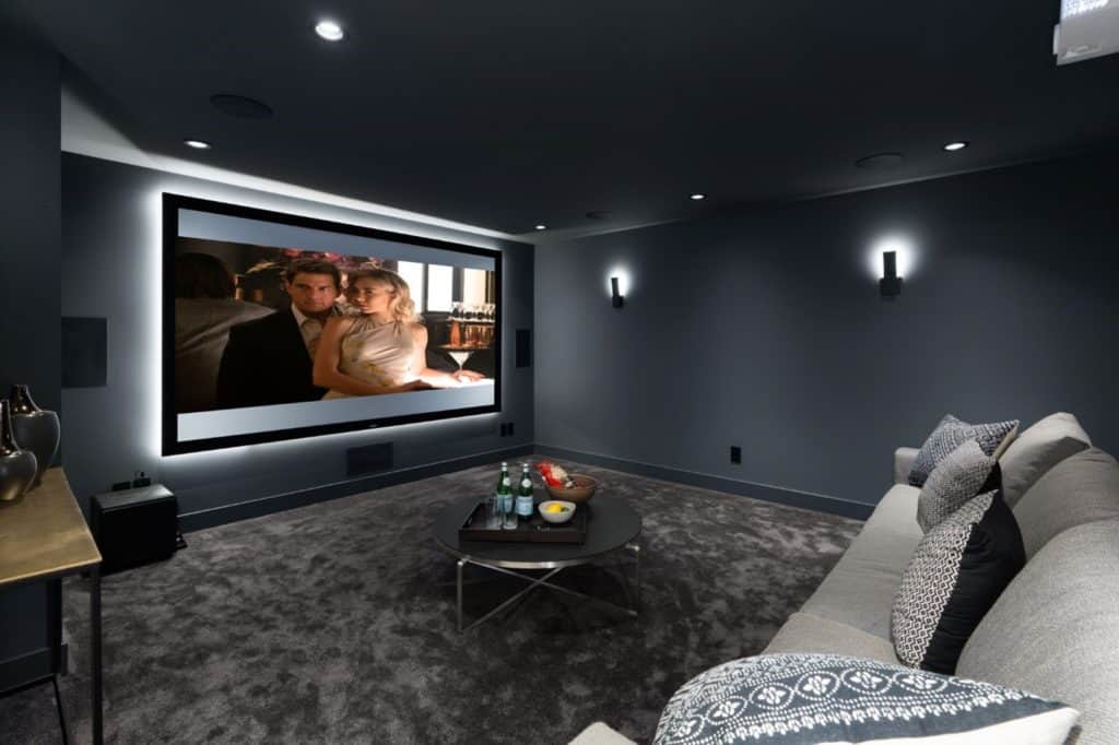 before and after photo of the home theatre